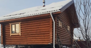 Баня из оцилиндрованного бревна под ключ в Гатчине - от 136318 рублей